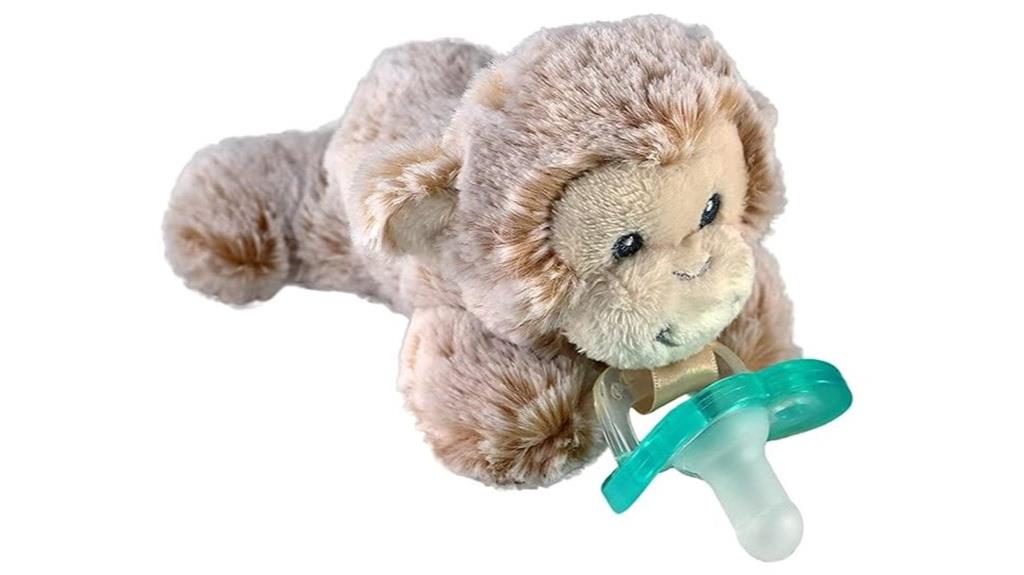 pacifier with monkey toy