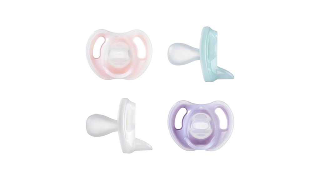 set of four pacifiers